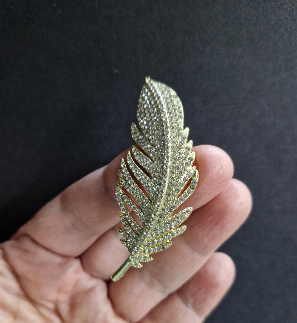 Leaf Brooch 2 (Category: Brooches) located in Taguig. Submitted by mommaschoice (Listing ID 1467946243, Image 2). Description: Brand new Adorned w/rhinestones Gold-Tone finish Lightweight won't damage the fabric Ships nationwide.