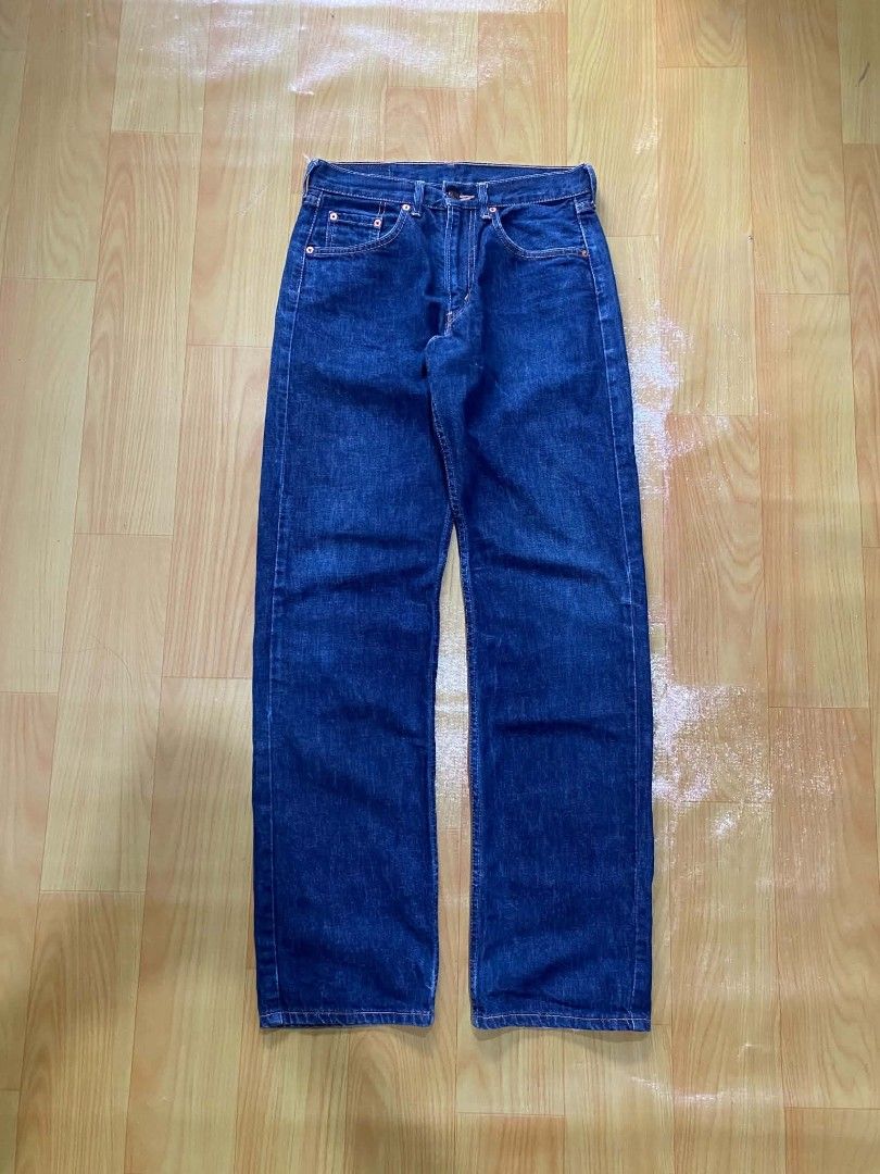 Levi's 512 (Category: Jeans) located in Tandag. Submitted by vncntmrcllns (Listing ID 1467922592, Image 2). Description: Waist: 30 Length: 43 - Brand: Levi's - Style: 512 Straight Leg - Size: W30 L34 - Wash: Dark wash / Clean indigo with minimal fading - Closure: Button fly - Details: Traditional orange stitching, copper rivets, iconic leather back waistband patch, and red tab on the right back pocket - Condition: Excellent, well-maintained.