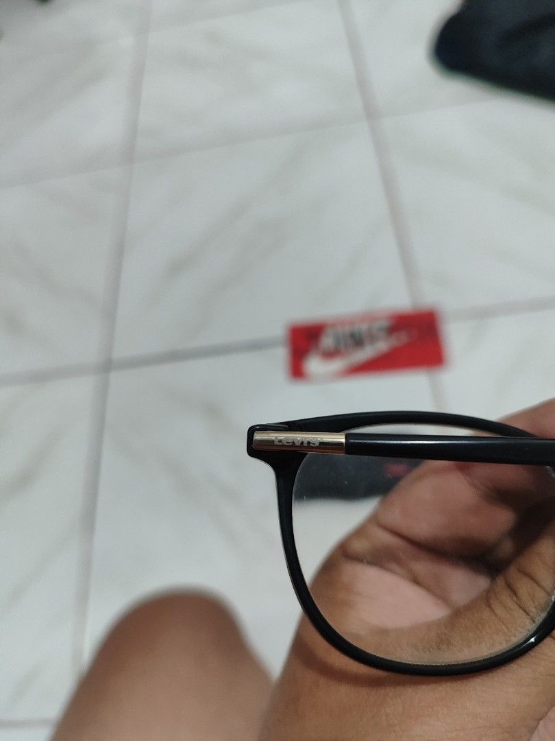 Levi's Black Round Eyeglasses frame with Case (Category: Sunglasses & Eyewear) located in Tuguegarao City. Submitted by johnpetera0818 (Listing ID 1468024025, Image 2). Description: - Brand: Levi's - Style: Round frames, black with gold metal temple accents - Model: BLK 53-18-145 - Fit: Lightweight and comfortable for daily wear - Lenses: Clear lenses currently installed (ready for your grade) - Inclusion: Original denim hard case with iconic Lev