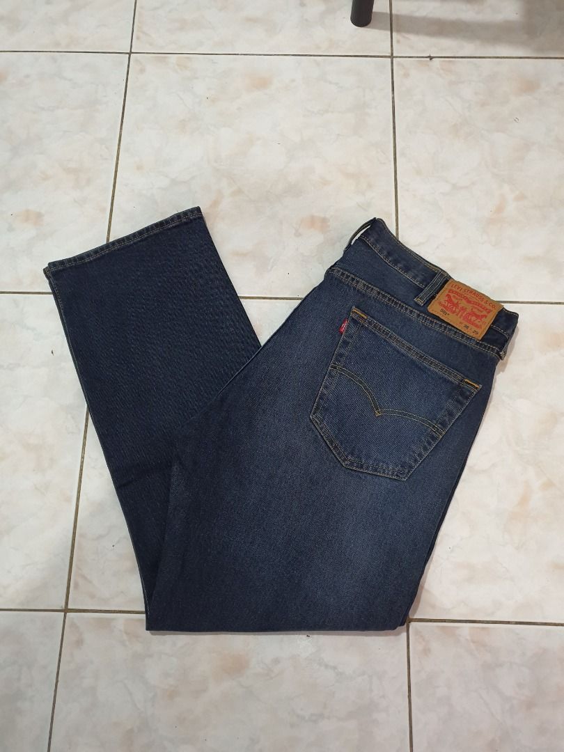 Levi's Dark Wash Denim Jeans (Category: Jeans) located in Caloocan City. Submitted by cleverwind_1e53ab (Listing ID 1467877003, Image 1). Description: - Brand: Levi's - Color/Wash: Dark wash - Size: 38x29 - Details: Classic five-pocket styling, signature red tab on back pocket, leather patch on waistband - Material: Sturdy denim with contrast stitching - Condition: Excellent, ready to wear.