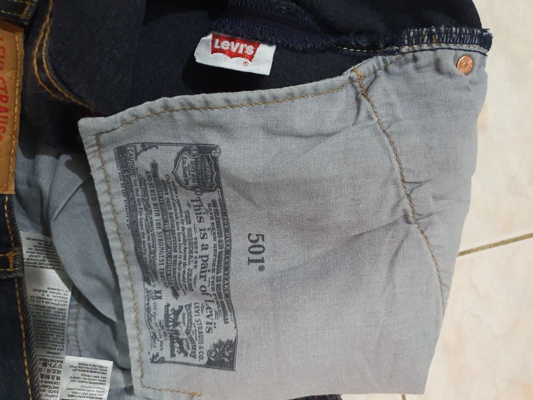 Levi's Dark Wash Denim Jeans (Category: Jeans) located in Caloocan City. Submitted by cleverwind_1e53ab (Listing ID 1467877003, Image 3). Description: - Brand: Levi's - Color/Wash: Dark wash - Size: 38x29 - Details: Classic five-pocket styling, signature red tab on back pocket, leather patch on waistband - Material: Sturdy denim with contrast stitching - Condition: Excellent, ready to wear.