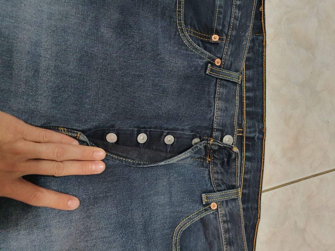 Levi's Dark Wash Denim Jeans (Category: Jeans) located in Caloocan City. Submitted by cleverwind_1e53ab (Listing ID 1467877003, Image 2). Description: - Brand: Levi's - Color/Wash: Dark wash - Size: 38x29 - Details: Classic five-pocket styling, signature red tab on back pocket, leather patch on waistband - Material: Sturdy denim with contrast stitching - Condition: Excellent, ready to wear.