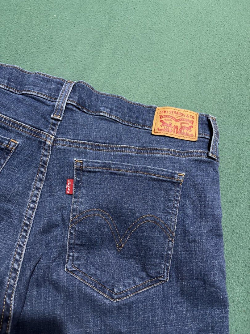 Levi's Denim Shorts Cuffed Blue (Category: Shorts) located in Guihulngan. Submitted by fbthriftgoodsniace (Listing ID 1467917398, Image 3). Description: - Brand: Levi's - Style: Classic five-pocket denim shorts with rolled cuffs - Wash: Medium blue - Size: Measures ~16 inches across waist (flat lay) - Details: Iconic red tab on back pocket and leather waistband patch - Material: Durable cotton blend denim - Condition: Great everyday basic - Size 