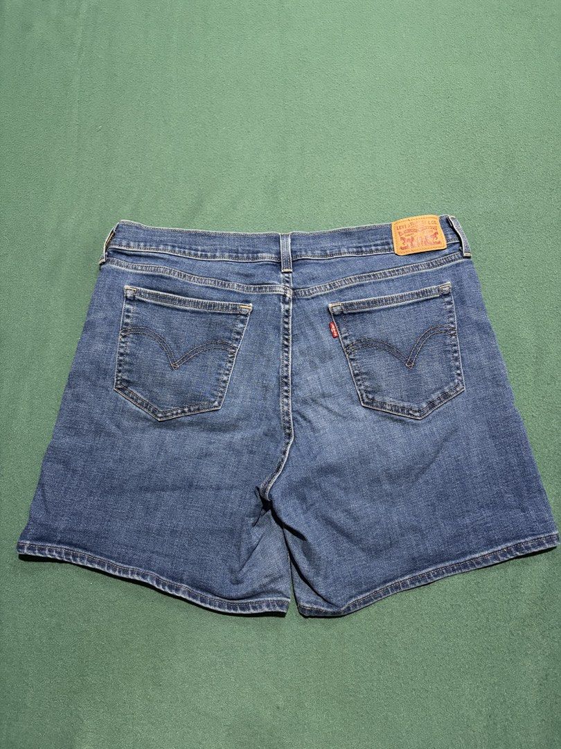 Levi's Denim Shorts Size 32 (Category: Shorts) located in Guihulngan. Submitted by fbthriftgoodsniace (Listing ID 1467917991, Image 1). Description: - Brand: Levi's - Style: Classic denim shorts - Size: 32 - Color/Wash: Medium blue wash - Features: Five-pocket styling, zipper fly, button closure, leather back patch, and signature red tab - Condition: Shows standard pre-loved wear, perfect for casual everyday use.