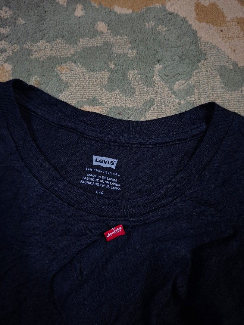 Levi's spell out logo shirt (Category: Tshirts & Polo Shirts ) located in Tagaytay City. Submitted by joselito_acosta (Listing ID 1468013152, Image 3). Description: Levis spell out logo shirt In excellent condition No issues 9.5/10 color rtae Large on tag 20.5"×28.5" Authentic ✅ ✅ ✅ Mine: 450+shipping fee Location: tagaytay Dm to purchase 📩 📩 📩.
