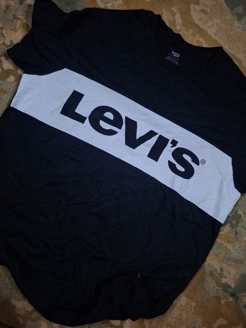 Levi's spell out logo shirt (Category: Tshirts & Polo Shirts ) located in Tagaytay City. Submitted by joselito_acosta (Listing ID 1468013152, Image 2). Description: Levis spell out logo shirt In excellent condition No issues 9.5/10 color rtae Large on tag 20.5"×28.5" Authentic ✅ ✅ ✅ Mine: 450+shipping fee Location: tagaytay Dm to purchase 📩 📩 📩.