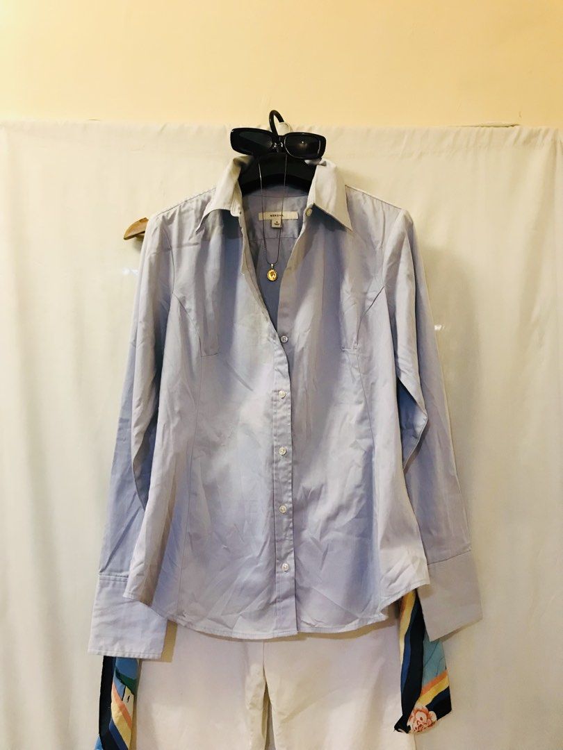 Light blue buttondown polo (Category: Blouses) located in Manila. Submitted by 414studio (Listing ID 1468043460, Image 1). Description: Medium Good quality In good condition (Scarf and accessories are not included) .