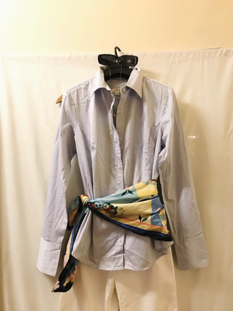 Light blue buttondown polo (Category: Blouses) located in Manila. Submitted by 414studio (Listing ID 1468043460, Image 2). Description: Medium Good quality In good condition (Scarf and accessories are not included) .