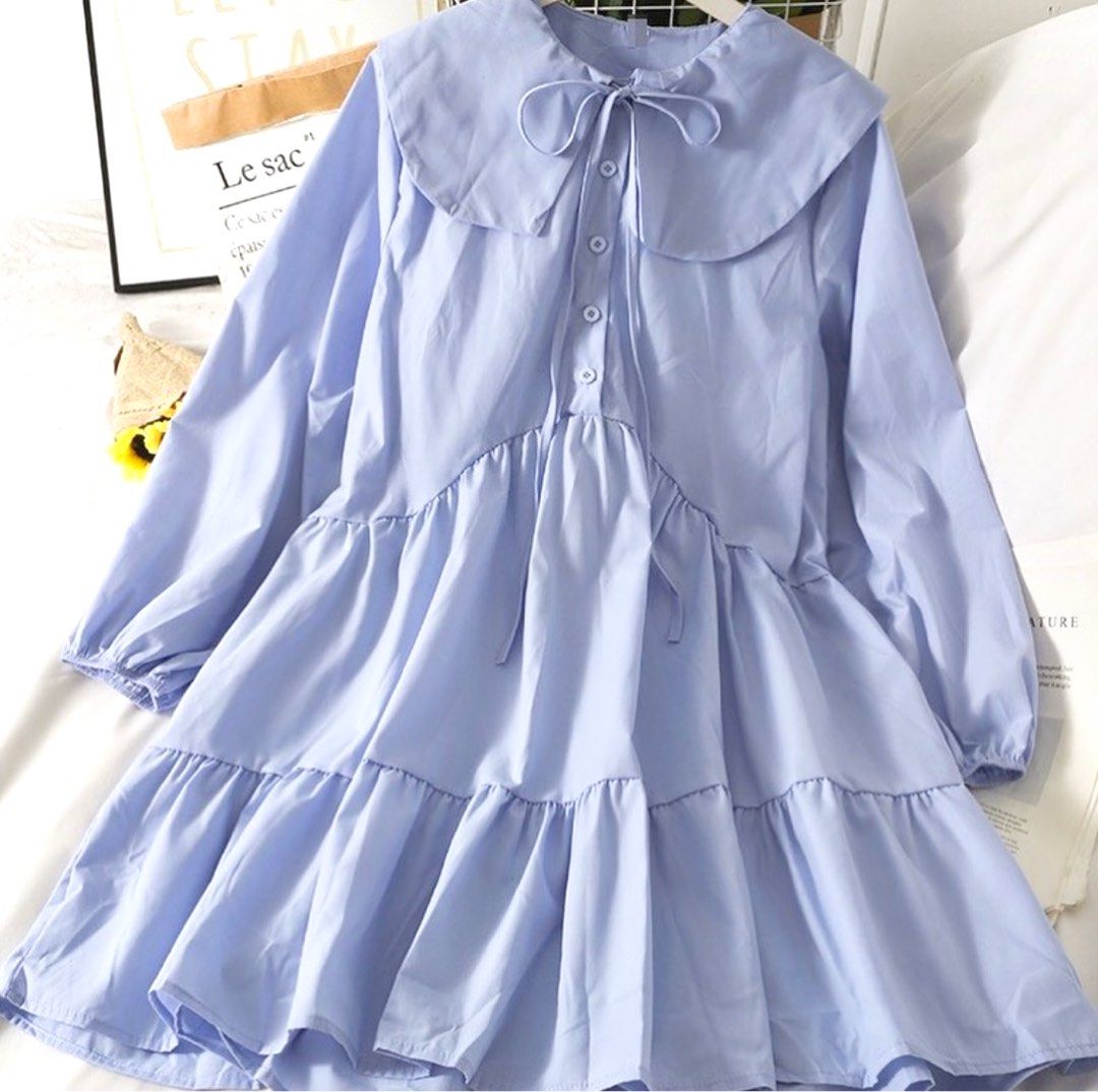 Light Blue Tiered Mini Doll Dress (Category: Dresses) located in Bacoor. Submitted by krisery (Listing ID 1467946589, Image 1). Description: - Color: Light Blue/Powder Blue - Style: Tiered mini dress with long sleeves - Size: Free Size (Fit Small to Large) - Details: Oversized Peter Pan collar with a cute bow tie and front button placket - Chest: 18 inch - Length: 35.5 inch - Fit: Comfortable elastic cuffs and a fun, bouncy gathered skirt - Funct