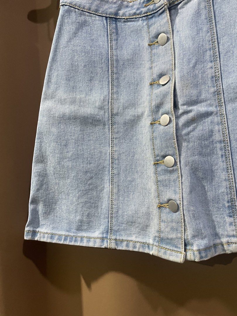 Light wash denim button-front mini skirt (Category: Skirts) located in Quezon City. Submitted by smileclothingline (Listing ID 1467855998, Image 3). Description: 🚚Courier: J&T/Lalamove/Gogoexpress 📍Shipping fee depends on your location 💸Mode of Payment: BPI/Gcash/Paymaya ‼️Payment first, only then will ship the item.