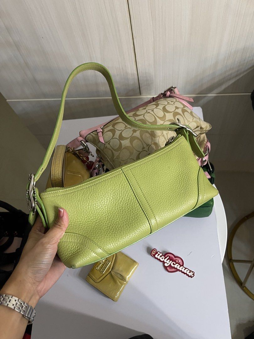 Lime Green Coach Leather Shoulder Bag (Category: Luxury Bags & Wallets) located in Manila. Submitted by lycahatesyou (Listing ID 1467995037, Image 3). Description: - Brand: Coach - Material: Lime green pebble leather - Hardware: Silver - Closure: Zip top with hanging tag - Shape: Structured rectangular with front seam details - Interior: Fits daily essentials easily - Condition: Minor corner wear visible on the bottom edges.