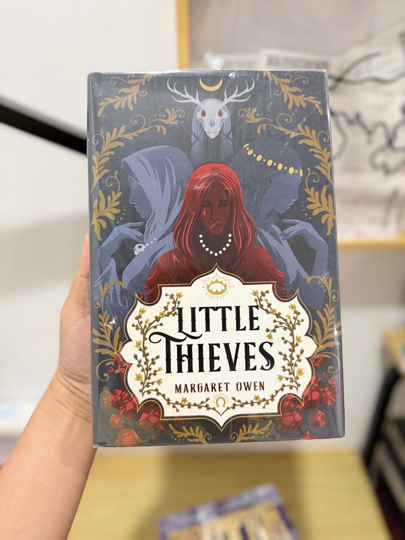 Little Thieves by Margaret Owen (Category: Storybooks) located in Toledo. Submitted by alziaron (Listing ID 1467954723, Image 1). Description: 📚 Title: Little Thieves by Margaret Owen Format: Hardcover Condition: See attached photos. Wrapped in protective plastic film; pages have minor yellowing along the edges from storage Mode of Payment 💰 Payment first through maribank/gotyme Mode of Delivery 🚚 Buyer will shoulder the shipping fee via J&T.