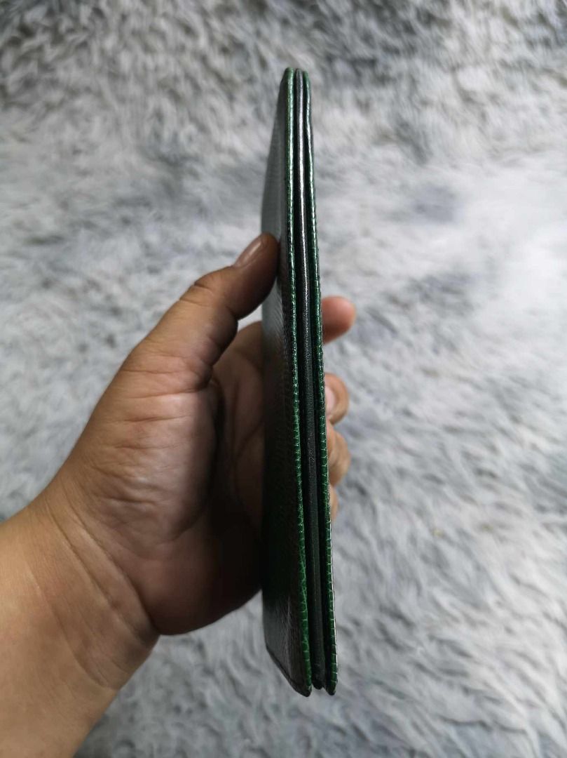 Lizard Skin Like Pattern Dark Green Long Wallet (Category: Wallets & Card holders) located in Santa Cruz. Submitted by jmy_surplus.2 (Listing ID 1467916449, Image 3). Description: Size ; L - 4 W - 7.2 Color ; Dark Green Type ; Wallet Brand ; No brand Material ; Leather Style ; Dark Green Leather Long Wallet LG 117 JMY 3 Batch #225.