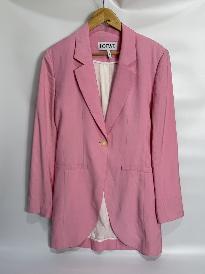 Loewe Pink Viscose Elastane Blazer Jacket Size L (Category: Coats, Jackets and Outerwear) located in Dasmarinas. Submitted by arjalaph (Listing ID 1467897436, Image 1). Description: - Brand: Loewe - Color: Pastel Pink - Size: L (Tag attached) - Origin: Made in Italy - Fit: Classic tailored fit with clean structured shoulders - Details: Single button closure, front welt pockets, fully lined interior.