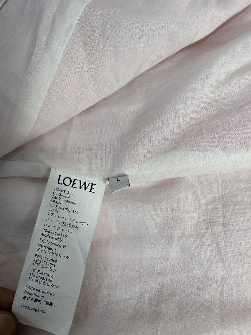 Loewe Pink Viscose Elastane Blazer Jacket Size L (Category: Coats, Jackets and Outerwear) located in Dasmarinas. Submitted by arjalaph (Listing ID 1467897436, Image 3). Description: - Brand: Loewe - Color: Pastel Pink - Size: L (Tag attached) - Origin: Made in Italy - Fit: Classic tailored fit with clean structured shoulders - Details: Single button closure, front welt pockets, fully lined interior.