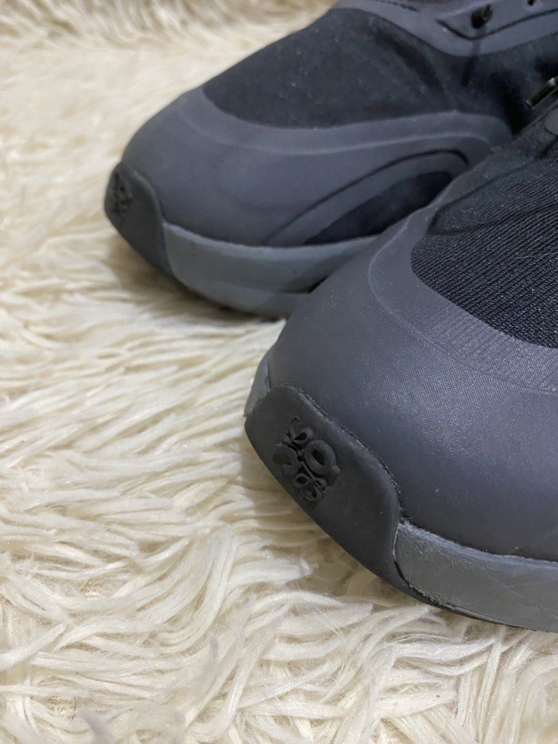 Loewe x On Cloudtilt Black Grey Sneakers (Category: Sneakers) located in Manila. Submitted by switchcity (Listing ID 1467878293, Image 2). Description: - Authentic Loewe x On Cloudtilt collaboration sneakers - Colorway: Sleek Black and Dark Grey - Slip-on design with elastic bungee lacing and toggle adjustment - Lightweight mesh upper with durable synthetic overlays - Signature cutout sole for ultimate cushioning and unique style - Distinctive Lo