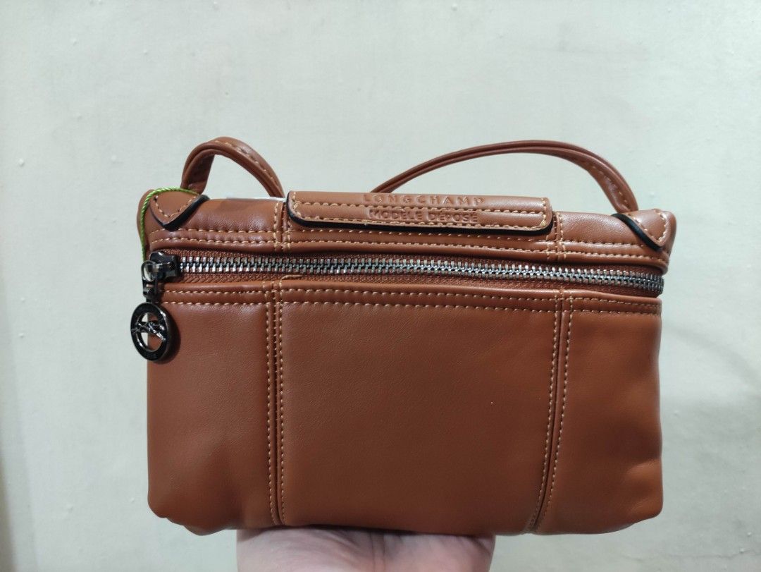 Longchamp Brown Crossbody Bag (Category: Luxury Bags & Wallets) located in Quezon City. Submitted by pprzi_89 (Listing ID 1467892239, Image 2). Description: + shipping fee - Condition: Brand new - Front pocket under flap.