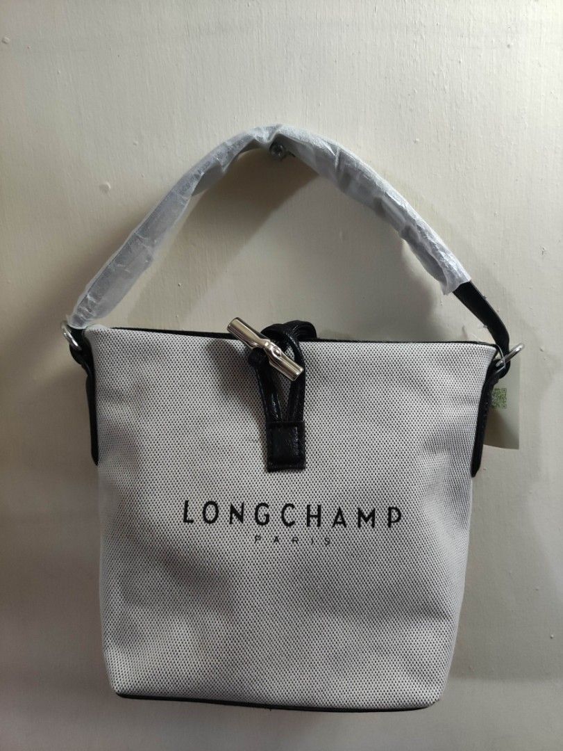 Longchamp Essential Bucket Bag (Category: Luxury Bags & Wallets) located in Quezon City. Submitted by pprzi_89 (Listing ID 1467891455, Image 1). Description: + shipping fee - shoulder strap - Extra crossbody strap - Condition: Brand new.