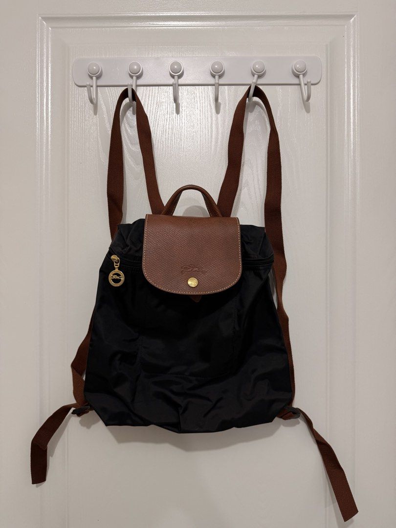 Longchamp Le Pliage Backpack BLACK (Category: Backpacks) located in Quezon City. Submitted by jkdaguio (Listing ID 1467877351, Image 3). Description: Bought in Changi airport With longchamp paperbag Loc: Commonwealth, Quezon City Shipping: Grab or Lalamove only MOP: Gcash/Maya/BPI.