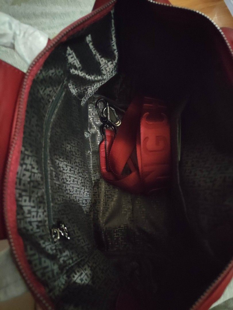 Longchamp Soft leather - Red with nylon strap (Category: Luxury Bags & Wallets) located in Quezon City. Submitted by pprzi_89 (Listing ID 1467890858, Image 2). Description: + shipping fee - Top short handle - Nylon adjustable shoulder strap - Condition: Brand new.
