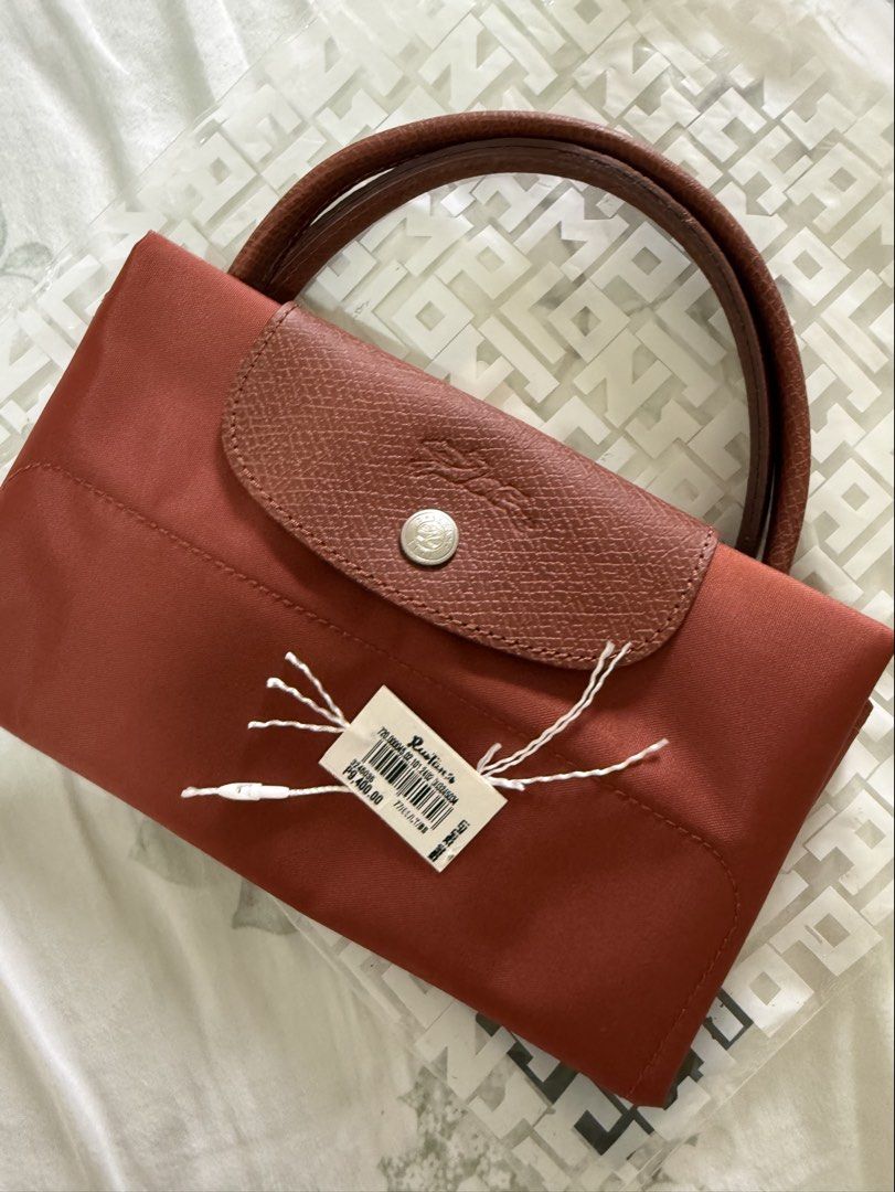 Longchamp Tote Bag Chestnut (Category: Luxury Bags & Wallets) located in Las Pinas. Submitted by prelovedcloset.kath (Listing ID 1467849878, Image 3). Description: Barely used, impulse buy, well kept Purchased from Rustans (Authentic) Rather keep than get lowballed .