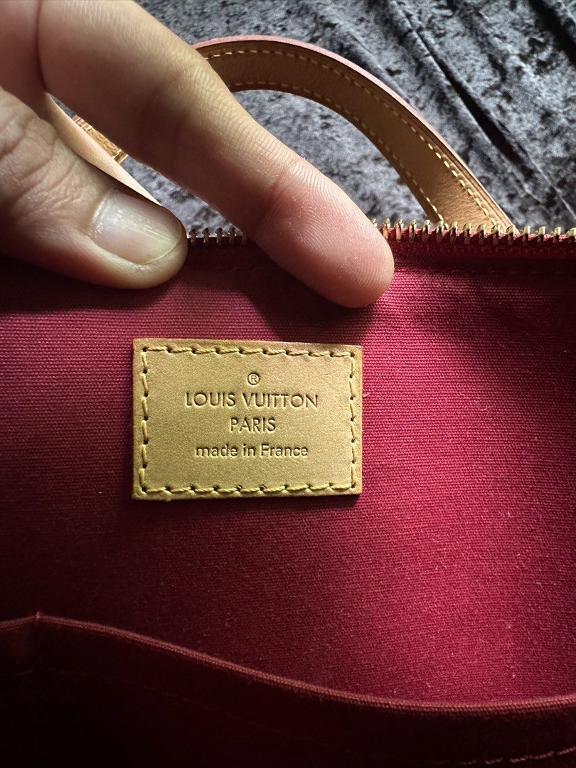 Louis Vuitton 2007 Monogram Vernis Bellevue PM Handbag (Category: Shoulder Bags) located in Digos. Submitted by jayarshop (Listing ID 1467859073, Image 3). Description: - vernis leather body - flat vachetta leather handles - top zip closure - interior slip pockets - red - This item has no inclusions. - Condition: GOOD. This previously owned and used item is in good condition with minimal signs of use. This may include fading of material or platin