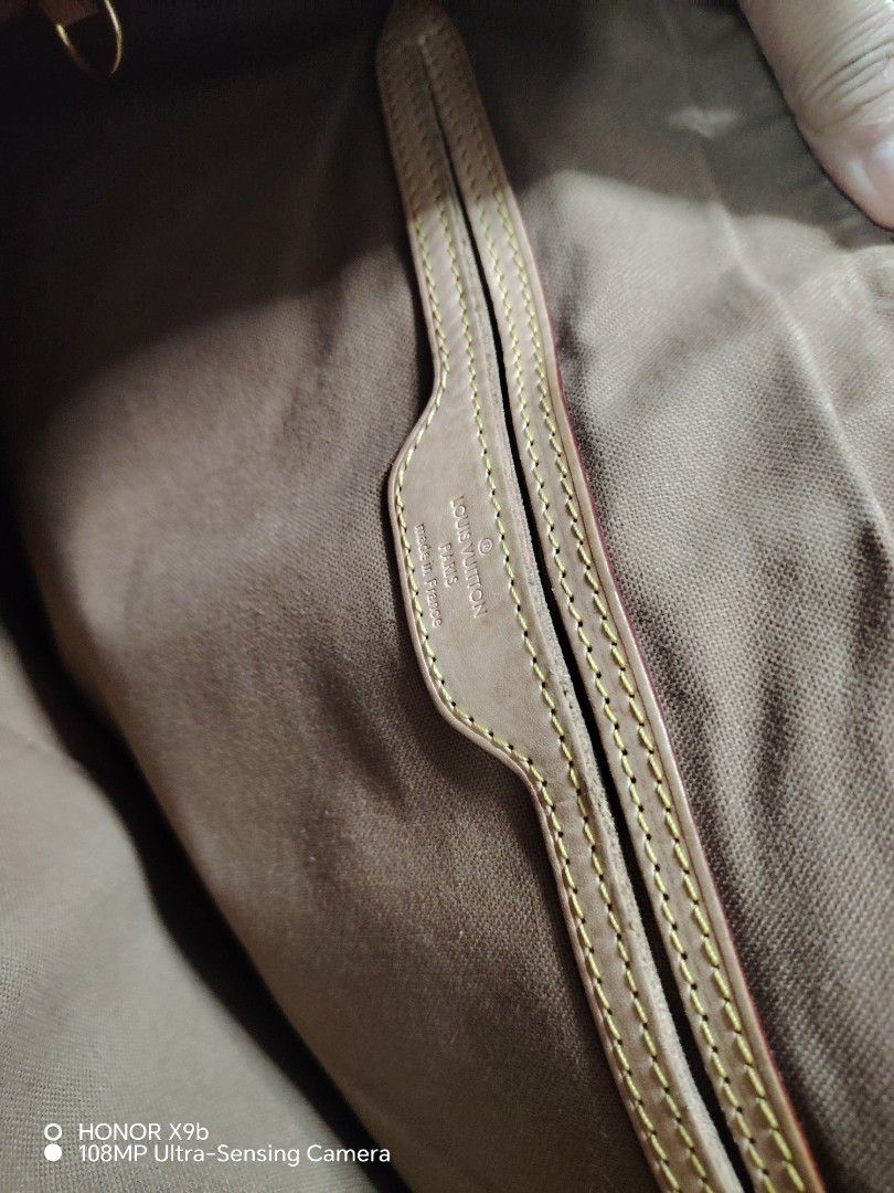 Louis Vuitton Monogram Canvas Tote Bag (Category: Luxury Bags & Wallets) located in Caloocan City. Submitted by truewater.fe5205 (Listing ID 1467904123, Image 3). Description: - Authentic Louis Vuitton monogram canvas tote in classic brown and tan - Secure zip-top closure with durable gold-tone hardware - Comfortable dual shoulder straps for everyday wear - Spacious interior fabric lining with leather logo patch - Verified production date code: T