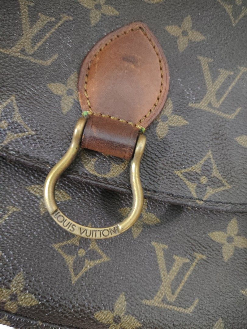 Louis Vuitton Monogram Canvas Crossbody Bag (Category: Luxury Bags & Wallets) located in Davao. Submitted by jenpolinar (Listing ID 1467973077, Image 3). Description: - Authentic Louis Vuitton monogram canvas crossbody bag - Classic brown canvas with signature print and vachetta leather trim - Adjustable shoulder strap for comfortable wear - Front flap closure with gold-tone LV stamped hardware ring - Natural patina on the leather tab with minor 