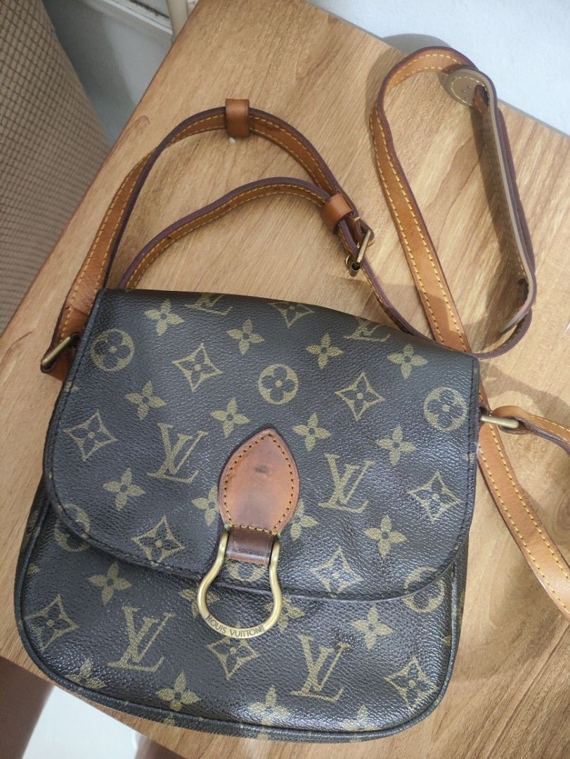 Louis Vuitton Monogram Canvas Crossbody Bag (Category: Luxury Bags & Wallets) located in Davao. Submitted by jenpolinar (Listing ID 1467973077, Image 2). Description: - Authentic Louis Vuitton monogram canvas crossbody bag - Classic brown canvas with signature print and vachetta leather trim - Adjustable shoulder strap for comfortable wear - Front flap closure with gold-tone LV stamped hardware ring - Natural patina on the leather tab with minor 