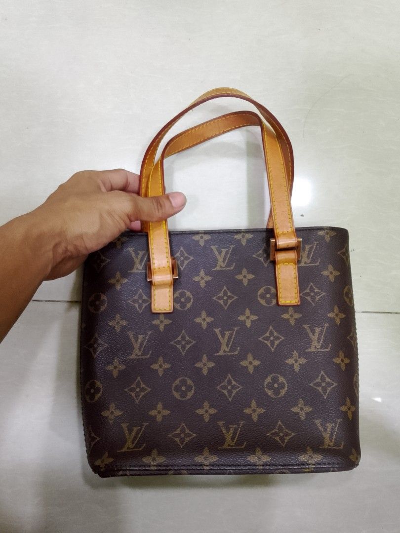 Louis Vuitton Monogram Canvas Tote Bag (Category: Luxury Bags & Wallets) located in Iloilo. Submitted by janillthrifted (Listing ID 1467979116, Image 1). Description: - Authentic Louis Vuitton monogram canvas tote - Classic brown canvas body with iconic LV print - Premium Vachetta leather handles and trim - Secure gold-tone zipper closure - Structured shape with dual top handles - Stamped Louis Vuitton Paris, Made in France - Serial number presen