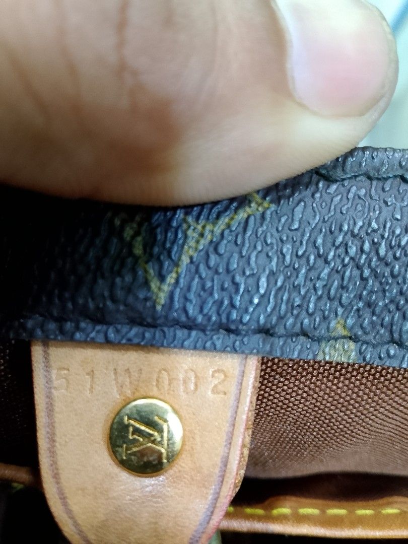 Louis Vuitton Monogram Canvas Tote Bag (Category: Luxury Bags & Wallets) located in Iloilo. Submitted by janillthrifted (Listing ID 1467979116, Image 3). Description: - Authentic Louis Vuitton monogram canvas tote - Classic brown canvas body with iconic LV print - Premium Vachetta leather handles and trim - Secure gold-tone zipper closure - Structured shape with dual top handles - Stamped Louis Vuitton Paris, Made in France - Serial number presen