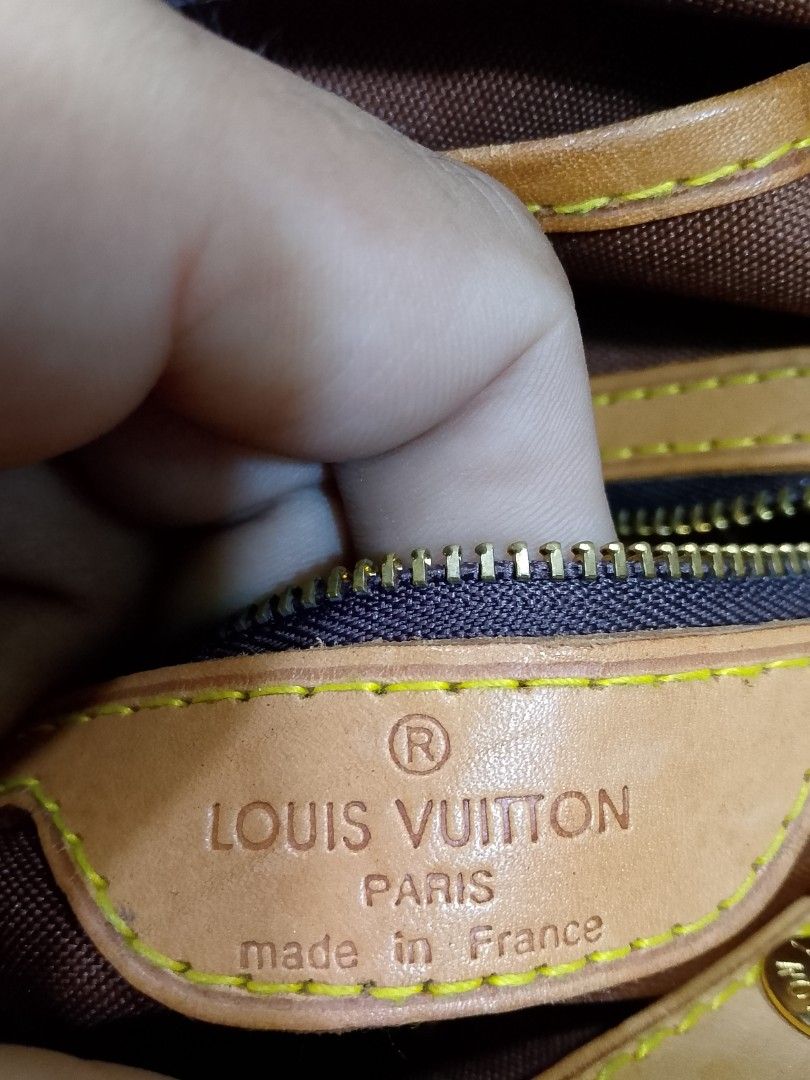 Louis Vuitton Monogram Canvas Tote Bag (Category: Luxury Bags & Wallets) located in Iloilo. Submitted by janillthrifted (Listing ID 1467979116, Image 2). Description: - Authentic Louis Vuitton monogram canvas tote - Classic brown canvas body with iconic LV print - Premium Vachetta leather handles and trim - Secure gold-tone zipper closure - Structured shape with dual top handles - Stamped Louis Vuitton Paris, Made in France - Serial number presen