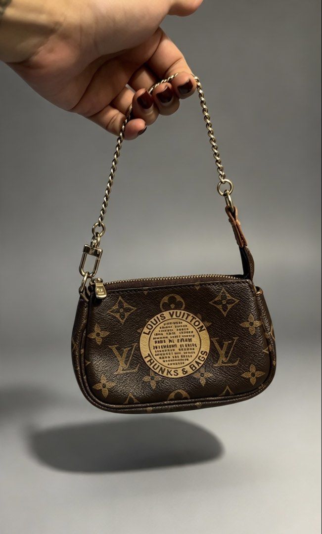 Louis Vuitton Monogram Canvas Trunks & Bags Accessorise Pouch (Category: Luxury Bags & Wallets) located in Malabon City. Submitted by lux4less_10 (Listing ID 1468038834, Image 1). Description: lv trunk mini pochete gold hardware ( needs to recolor the hardware ) working zipper bought in osaka japan SELLING LOW‼️ a liitle bag spa and it looks new again. no hidden issue..