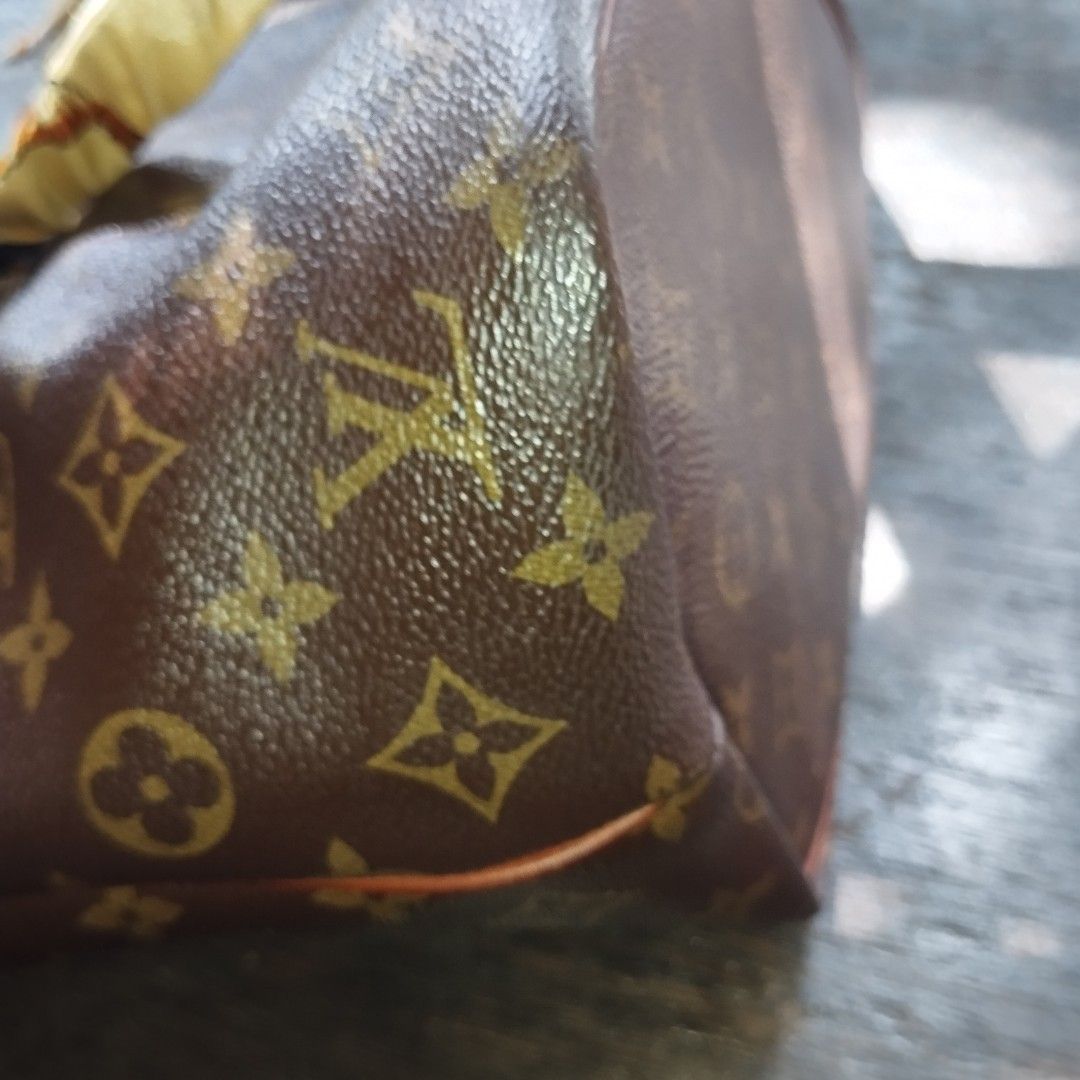 Louis Vuitton Monogram Canvas Tote Handbag (Category: Luxury Bags & Wallets) located in Manila. Submitted by lene48 (Listing ID 1468059080, Image 3). Description: - Authentic-style classic brown Monogram canvas tote bag - Premium leather trim with gold-tone zipper closure - Stylish wrapped handles featuring a printed twilly scarf accessory - Structured shape with a dark brown textile-lined interior - Signature embossed Louis Vuitton leather patch