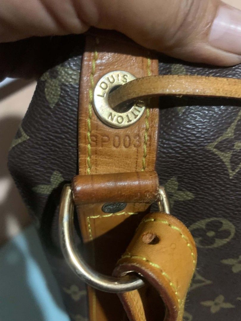 Louis Vuitton Monogram Noe Bucket Bag (Category: Luxury Bags & Wallets) located in Aliaga. Submitted by akishaoshop2010. (Listing ID 1468055462, Image 2). Description: - Authentic classic monogram canvas bucket bag - Vachetta leather trim with a natural honey patina from normal aging and handling - Adjustable shoulder strap and secure drawstring top closure - Date code: SP0038 - Hardware has slight tarnishing - Canvas body is clean and intact.