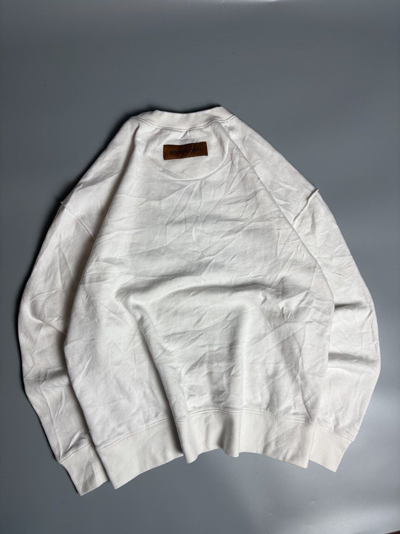 Louis Vuitton White Sweatshirt XL (Category: Coats, Jackets and Outerwear) located in Manila. Submitted by livefalcon-c64e (Listing ID 1467944300, Image 2). Description: - Brand: Louis Vuitton - Item: Crewneck Sweatshirt - Size: XL - Color: White - Material: Soft cotton fleece (Made in Italy) - Design: Classic crewneck with stitched V-insert, interior neck label, and outer back brown label detail - Features: Long sleeves with ribbed cuffs and hem