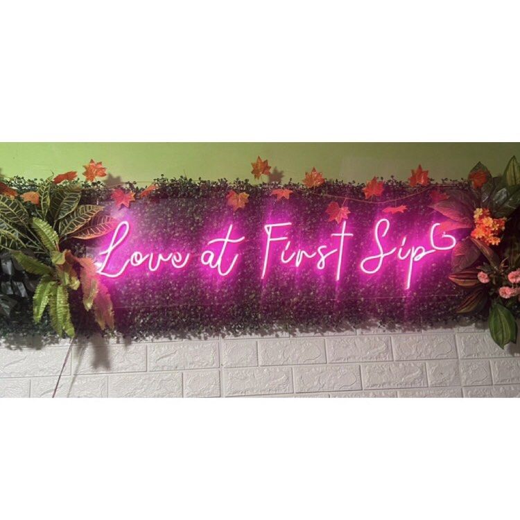 Love at First Sip LED Neon Sign (Category: Wall Decor) located in Cavite. Submitted by kkuumma (Listing ID 1467878498, Image 1). Description: - Bright pink LED neon sign with the text "Love at First Sip" - Mounted on a durable clear acrylic backing - Fully functional with a beautiful, vibrant glow - Ideal aesthetic decor for cafes, bars, or bedrooms - Easy to hang on any wall - Conveniently powered via cable.