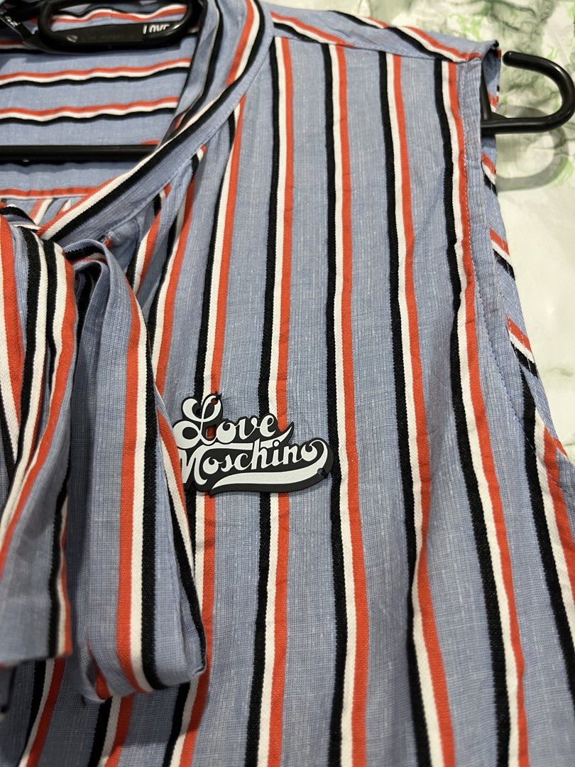 LOVE MOSCHINO top (Category: Blouses) located in Bulacan. Submitted by letsfindukaywithme (Listing ID 1468049396, Image 3). Description: Love Moschino blouse Size 6 18x23" Fits Medium Like new No issue +sf payment first Ship via J&T.