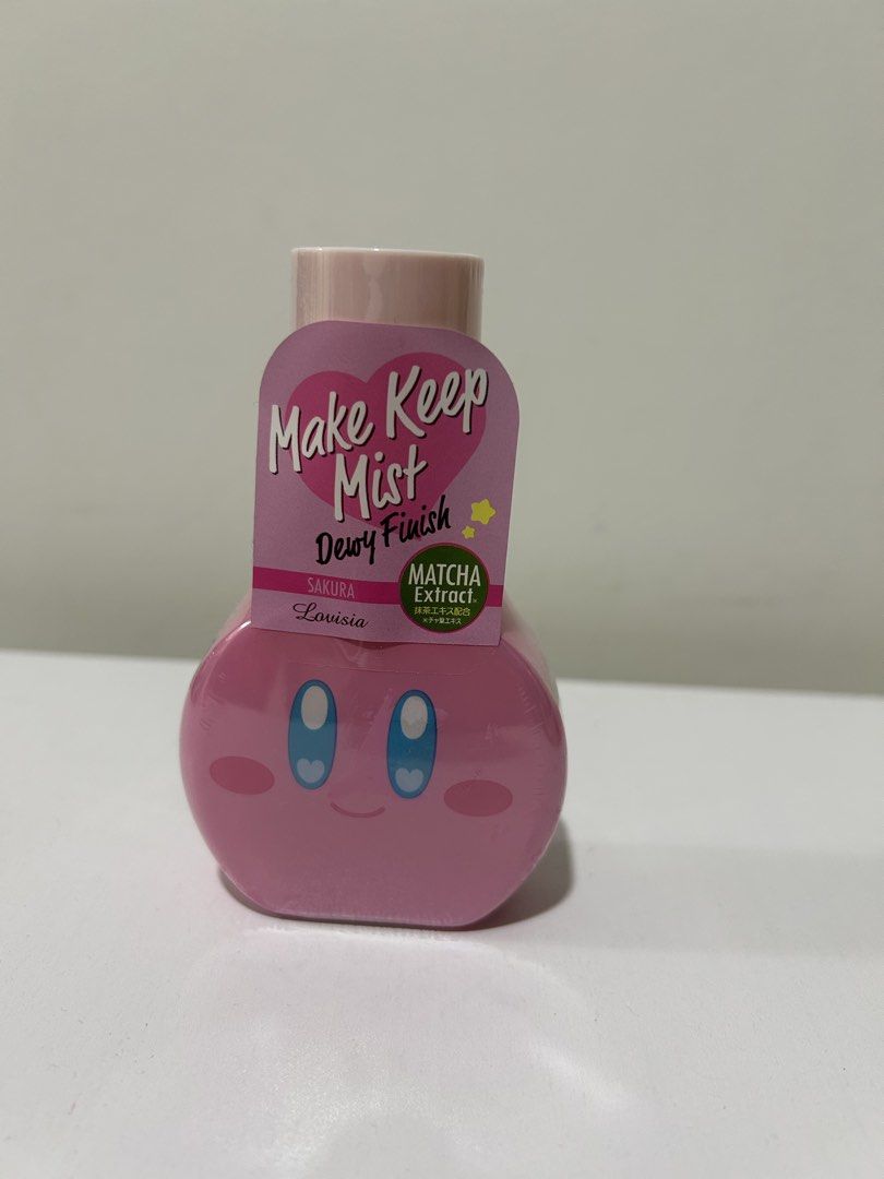Lovisia Kirby Face Mist (Category: Makeup) located in Rizal. Submitted by CMaeCAme (Listing ID 1467956271, Image 1). Description: (01 Cherry Blossom / Sakura), a Japanese setting and hydrating facial spray featuring a pink Kirby design.
