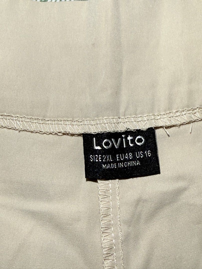 Lovito Beige Shorts Size 2XL EU48 US16 (Category: Shorts) located in San Miguel. Submitted by matchalatte23_ (Listing ID 1467997634, Image 2). Description: - Brand: Lovito - Size: 2XL (EU 48, US 16) - Color: Light beige (easy to match with any top) - Details: Double button front waist closure with pleated accents - Condition: Pre-loved with visible faint stains near the bottom hem (kindly check photos for reference) - Perfect for daily casual fit