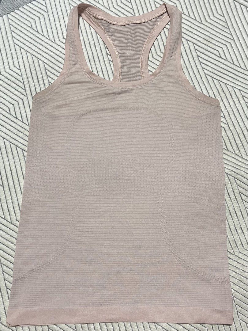 Lululemon Align Tank Top Pale Pink (Category: Sleeveless) located in Manila. Submitted by rayuki39 (Listing ID 1461790087, Image 2). Description: - Light pink Lululemon Align tank - Racerback style - Ultra-soft, seamless fabric - Ideal for workouts and everyday wear - Lululemon logo detail on the back.