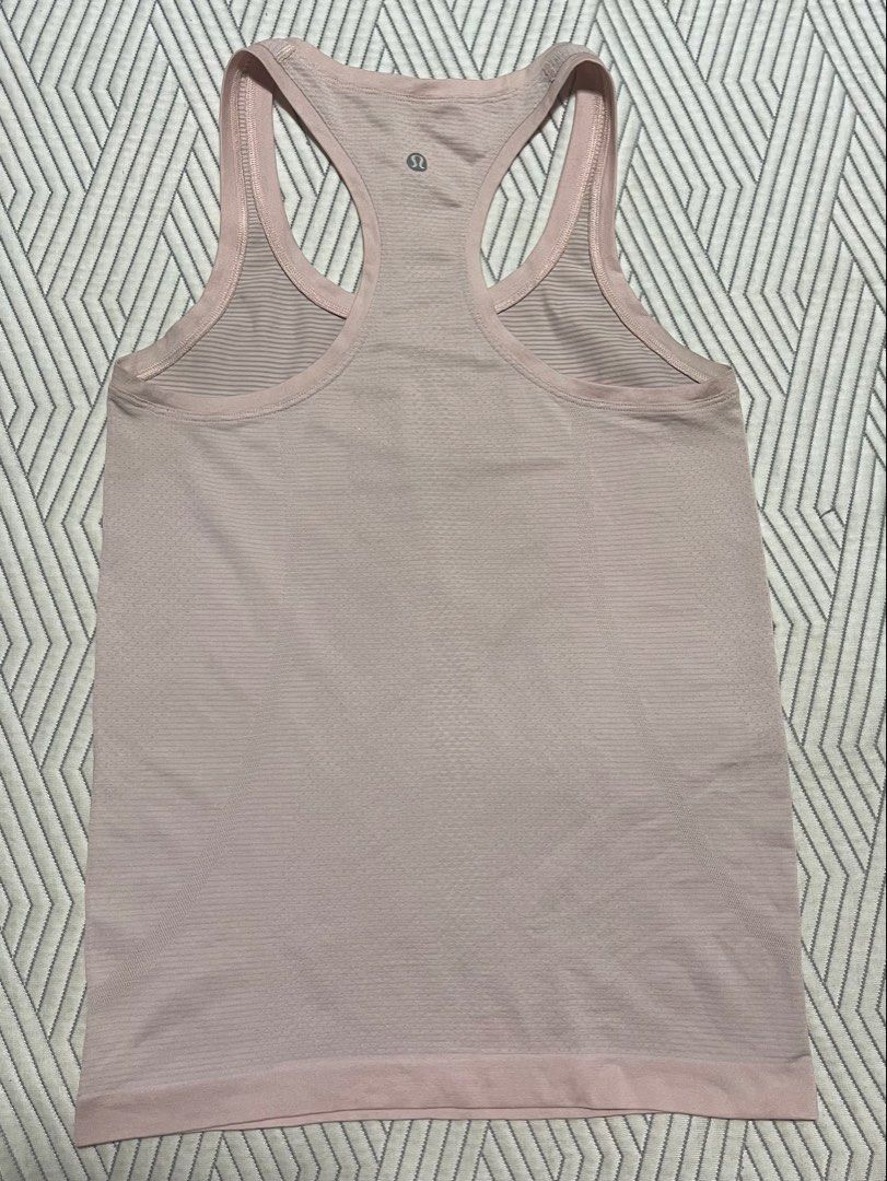 Lululemon Align Tank Top Pale Pink (Category: Sleeveless) located in Manila. Submitted by rayuki39 (Listing ID 1461790087, Image 3). Description: - Light pink Lululemon Align tank - Racerback style - Ultra-soft, seamless fabric - Ideal for workouts and everyday wear - Lululemon logo detail on the back.