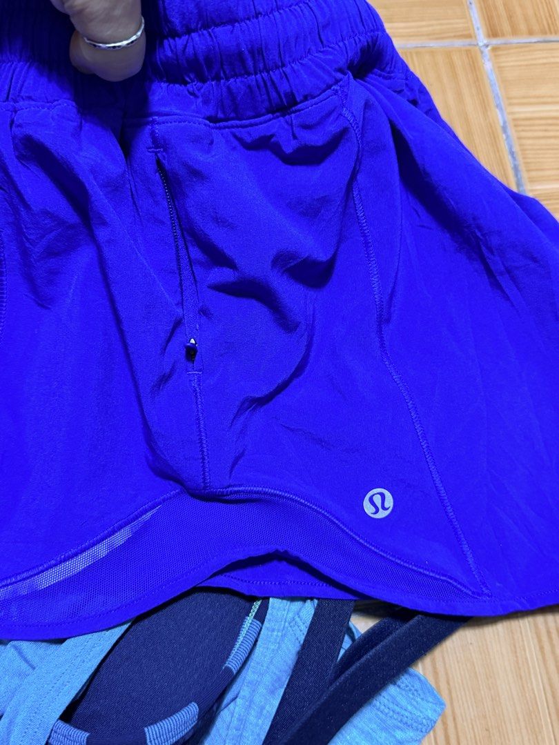Lululemon Athletic Tanks and Shorts Bundle (Category: Activewear) located in Paete. Submitted by skydruemadison (Listing ID 1467944180, Image 3). Description: - Brand: Lululemon - Set includes: 2 light blue athletic tanks and 1 royal blue athletic shorts - Features: Convenient side zipper pocket on shorts - Sizes: 4 & 6 - Ideal for: Running, gym workouts, yoga, or everyday casual wear bundle price.