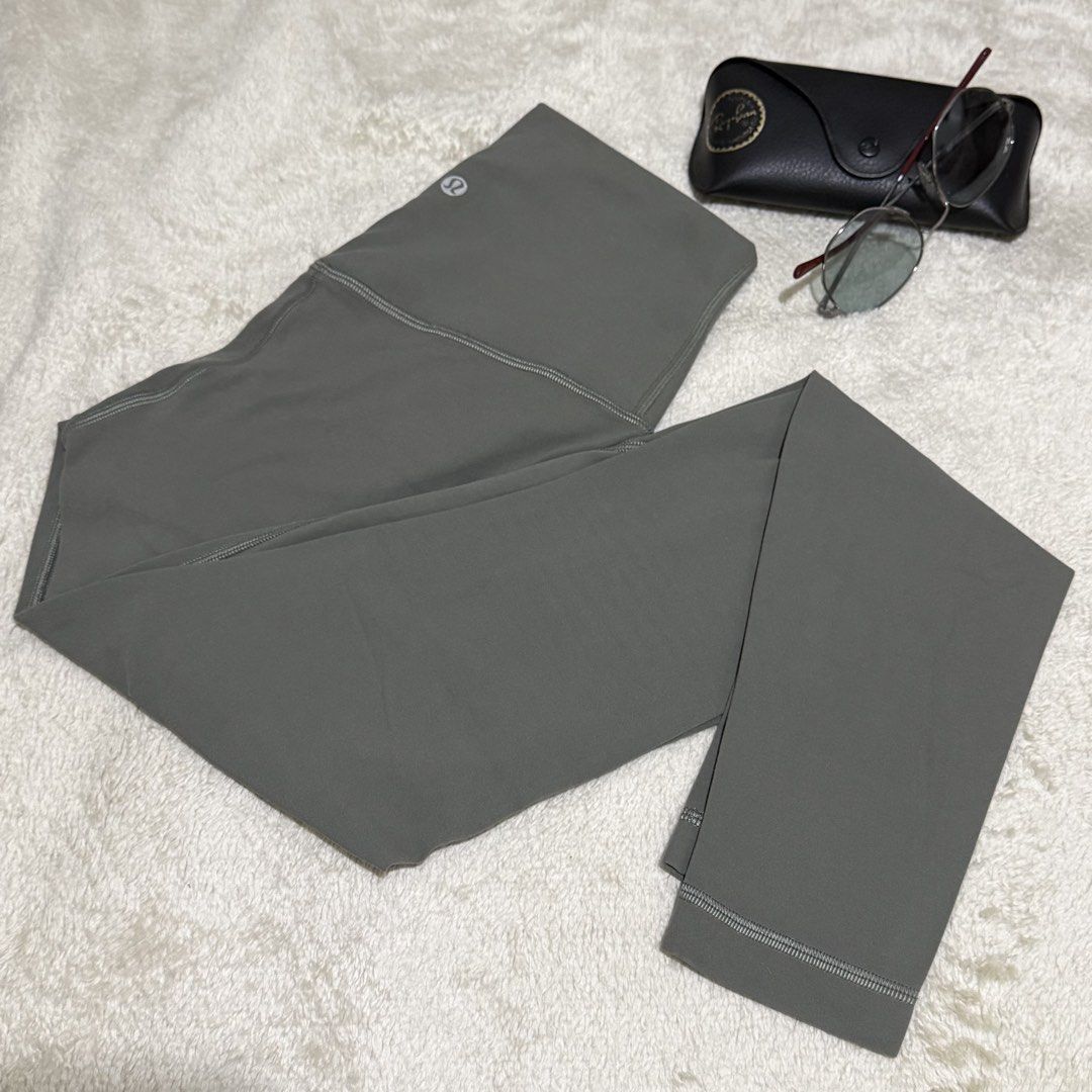 Lululemon Leggings Size 4 Grey (Category: Activewear) located in Caloocan City. Submitted by bellita_05 (Listing ID 1467987979, Image 1). Description: - Brand: Lululemon - Color: Greyish Green - Size: 4 (Dot tag verified inside waistband) - Rise: High rise for a flattering fit - Fabric: Ultra-stretchy, breathable, and comfortable - SF via J&T.