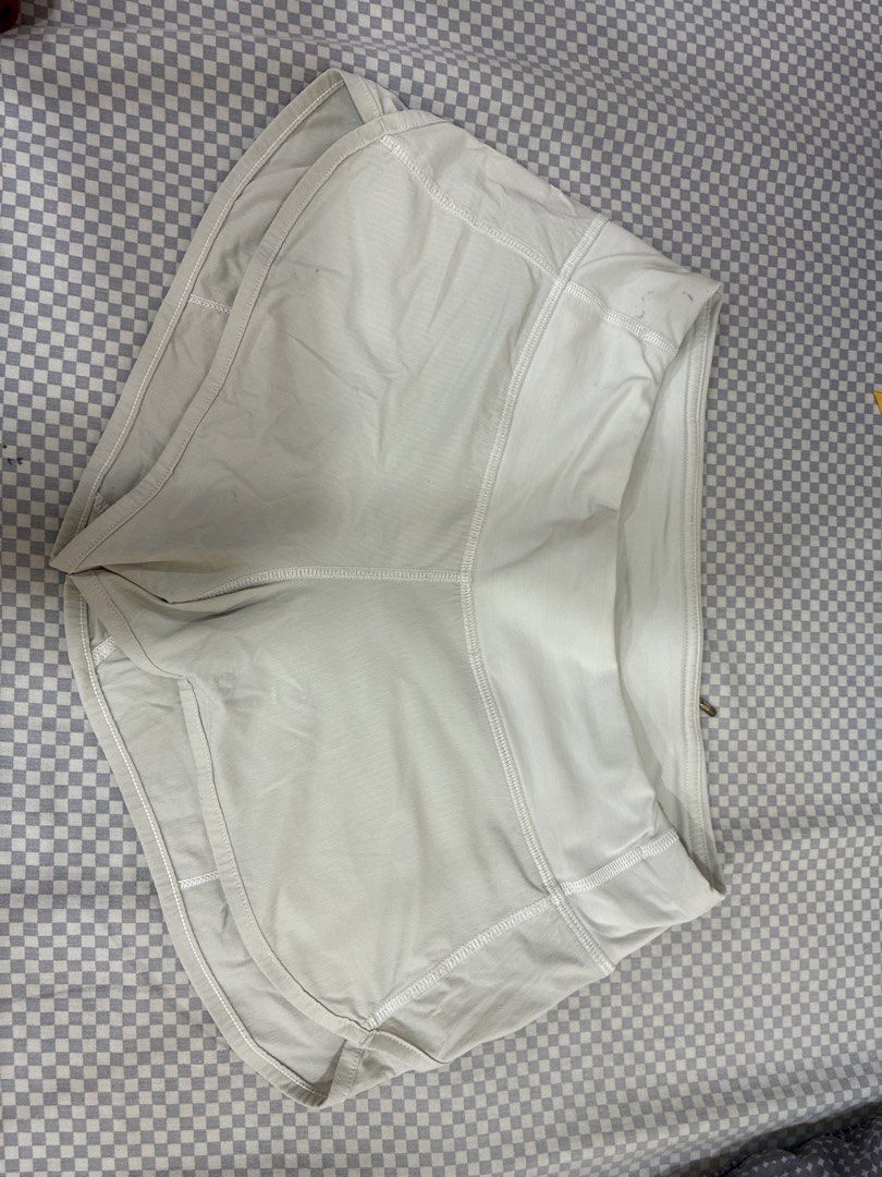 Lululemon Speed Up Shorts White (Category: Shorts) located in Manila. Submitted by shopmyclothesguys (Listing ID 1467922899, Image 1). Description: - Brand: Lululemon - Color: White - Style: Lightweight running shorts with inner lining - Features: High-rise waistband, secure back zip pocket, reflective logo on back hem - Condition: Good, but has small ink stains near the front seam (clearly shown in the 2nd photo) - Perfect for your daily runs an