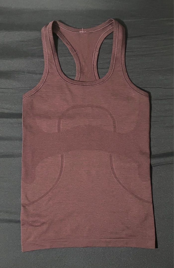Lululemon Swiftly Tech Racerback Plum / Black - 4 (Category: Activewear) located in Manila. Submitted by maefinds.ph (Listing ID 1467947932, Image 3). Description: ✨In excellent condition ✨size 4 ✨color may cary due to lighting but actual color is plum/black as shown in the reference ✨Intact logo PM for more details Price is slightly negotiable .