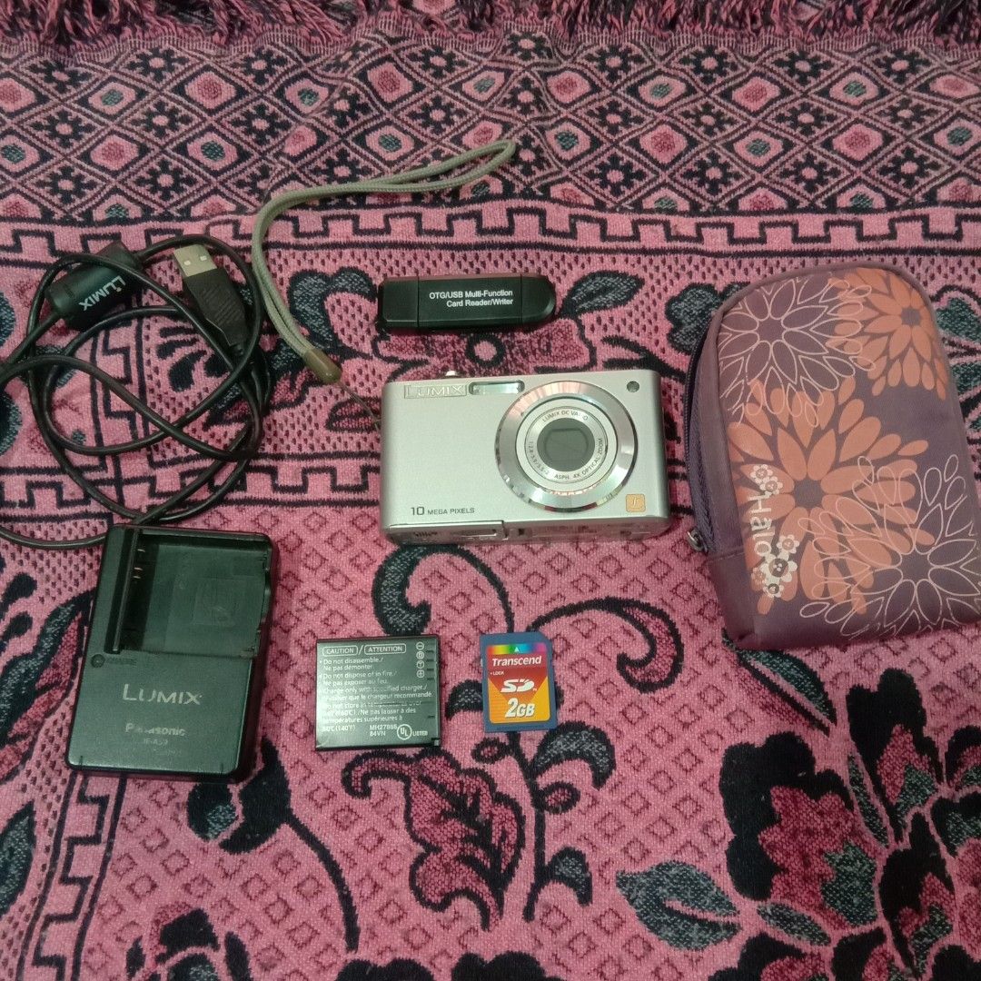 Lumix Panasonic Digital Camera 10 MP (Category: Cameras) located in Cainta. Submitted by oreo_cat01 (Listing ID 1467877823, Image 1). Description: 10 mega pixel with free camera mini bag with free OTG card/reader writer with charger and battery camera flaws as shown on pics.