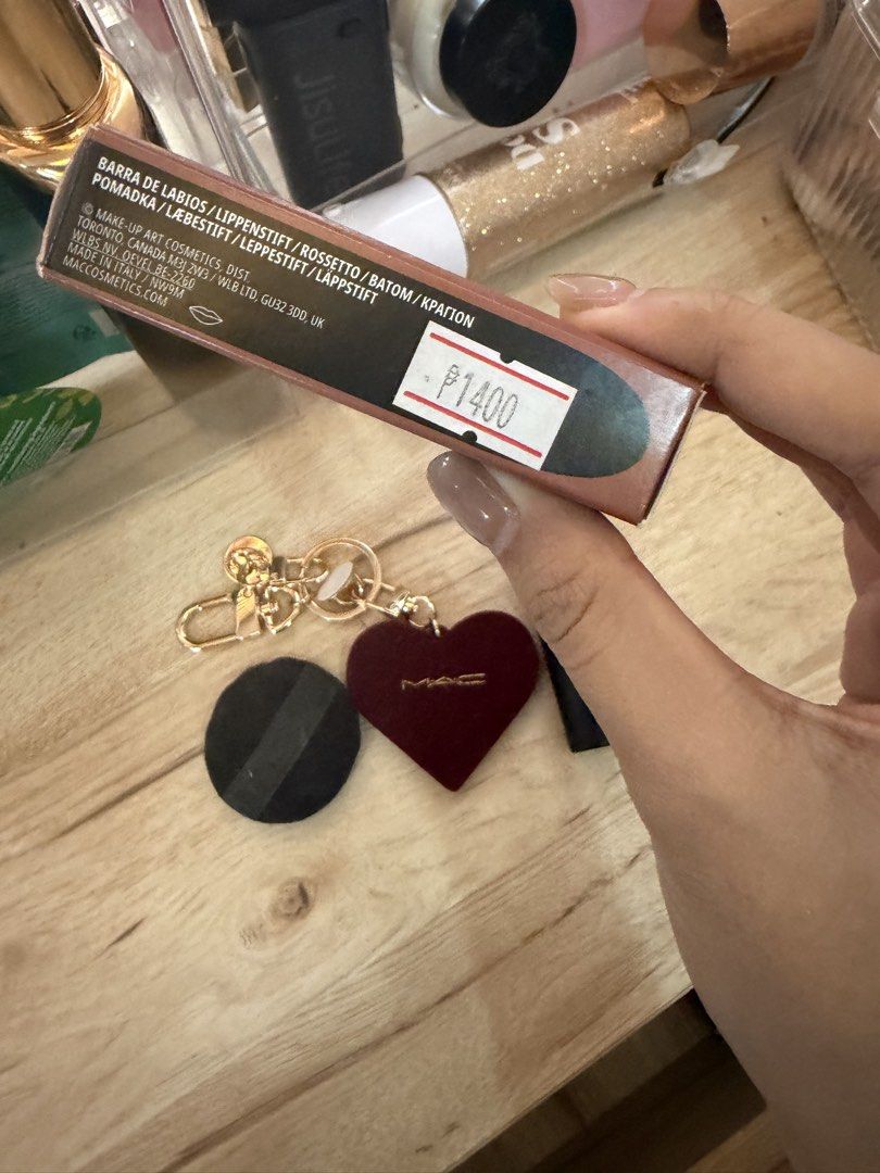 MAC lipstick, puff and keychain (Category: Makeup) located in Manila. Submitted by mamaansshop (Listing ID 1467906361, Image 2). Description: TAKE ALL for 800 lipstick is brand new sa sm makati galing.