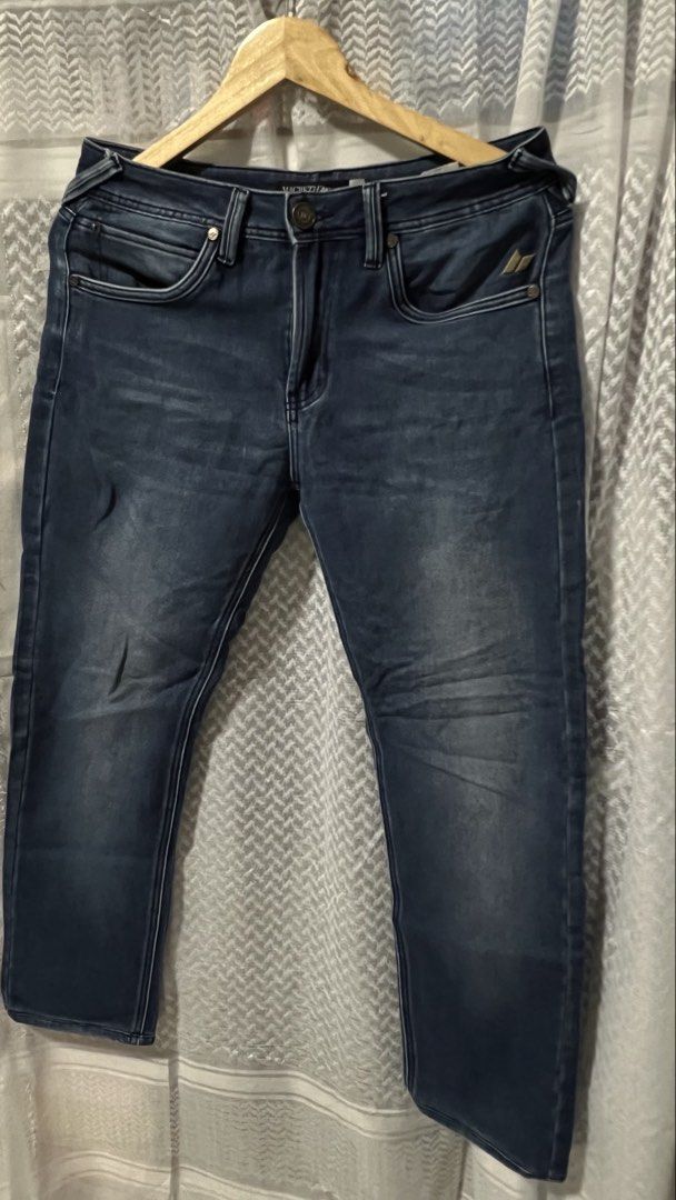 Macbeth California Dark Blue Denim Jeans Size 31 (Category: Jeans) located in Pasig City. Submitted by morilove (Listing ID 1467844532, Image 1). Description: - Brand: Macbeth California - Style: Denim jeans in dark blue wash - Size: 31 (Tag on waistband, approx. 15 inches across waist laid flat) - Closure: Button fly with branded hardware - Details: Custom graphic patch on back pocket, contrast stitching, and front coin pocket - Condition: Excel