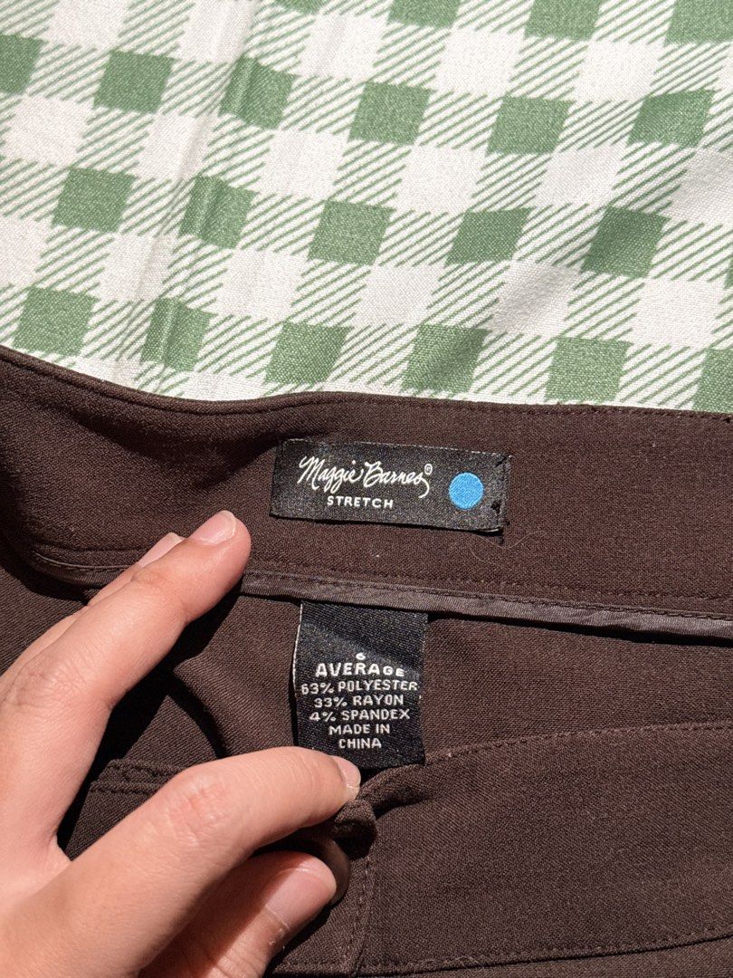 Maggie Barnes Brown Stretch Pants Size 6 Average (Category: Jeans) located in San Miguel. Submitted by matchalatte23_ (Listing ID 1467994050, Image 3). Description: - Brand: Maggie Barnes - Size: 6 (Average) - Color: Solid Dark Brown - Material: 63% Polyester, 33% Rayon, 4% Spandex (Comfortable stretch fabric) - Features: Structured waistband and button closure - Origin: Made in China.